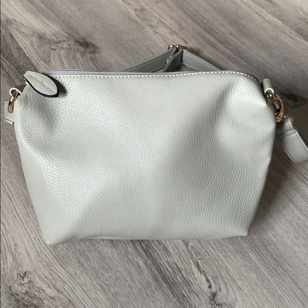 Light grey. Brand new. Imoshion purse